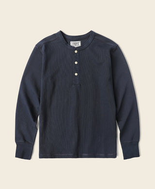 Navy long-sleeve henley shirt with button placket and crew neckline.