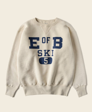 Cream V-inset ski sweatshirt with blue “OF B SKI 5” front graphic