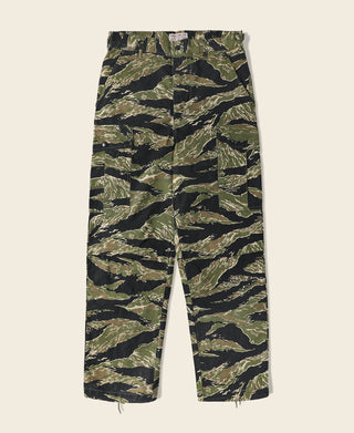 Tiger stripe camo fatigue pants with straight legs and front button closure.