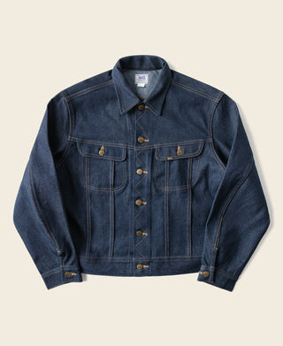 Indigo denim jacket with button front, flap chest pockets, and long sleeves.