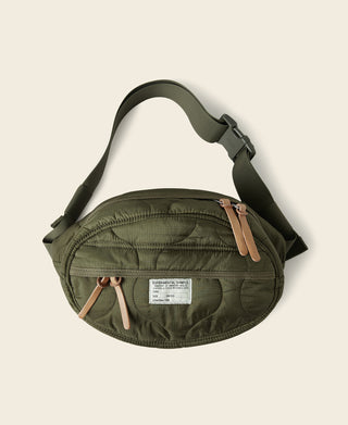 Olive waist bag with adjustable shoulder strap and front zip pocket