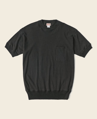 Black waffle-knit pocket t-shirt with crew neck and short sleeves