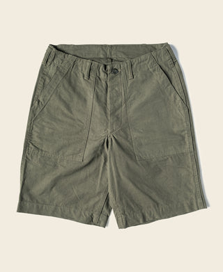 Olive fatigue utility shorts with pleated front and button closure at waistband