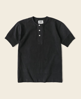 Black henley T-shirt with short sleeves and buttoned placket