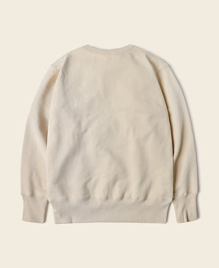 Apricot crewneck sweatshirt back view with ribbed cuffs and hem