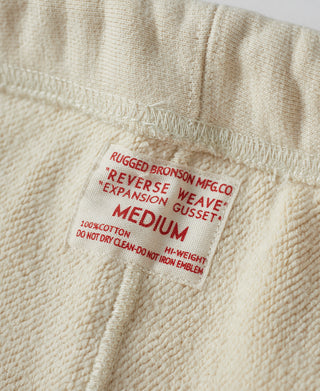 Apricot sweatpants size tag marked MEDIUM