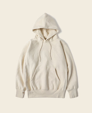 Light apricot reverse-weave hoodie with front pouch pocket and drawstring hood