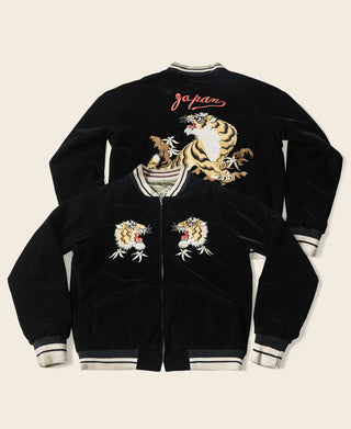 Black reversible souvenir jacket with tiger embroidery and 'japan' script on the back.