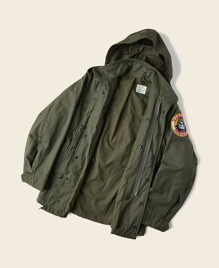 Olive field jacket open front with buttoned interior lining and sleeve patch