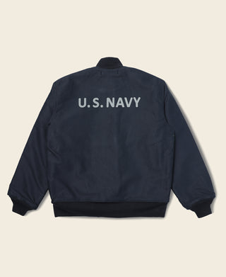 Navy deck hook jacket back with "U.S. NAVY" print and ribbed hem