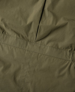 Olive down parka with stitched seam detail and zip placket panel