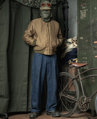 Khaki deck jacket worn with jeans, front view