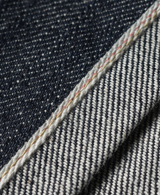 Indigo selvedge denim jacket, exposed selvedge edge with multicolor stripe