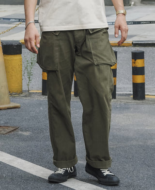 Olive utility cargo pants with pleated front and side flap cargo pocket