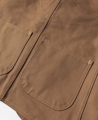 Khaki canvas hunting vest with chest pocket and button front