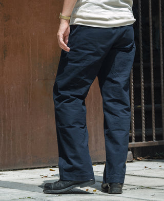Navy cotton officer trousers with relaxed legs and stitched seams