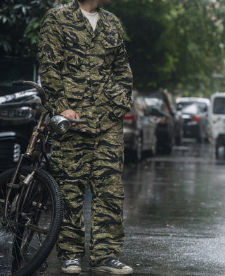 Tiger stripe camo fatigue jacket with long sleeves and button-front