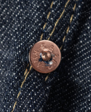 Indigo denim jacket button with RRL logo, copper-tone metal closure