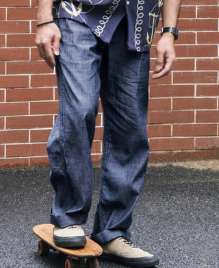Indigo chambray double-pleated pants worn, front view