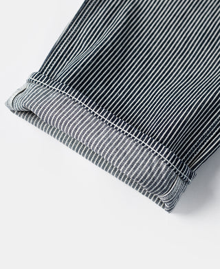 Striped carpenter pants, striped fabric with folded cuff and dark stitching