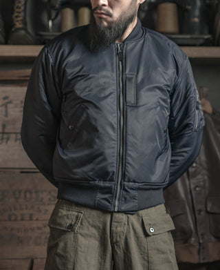 Navy zip-up flight jacket with stand collar, chest pocket, and ribbed hem cuffs