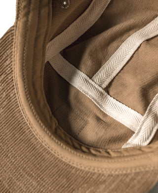 Khaki corduroy 5-panel cap interior view with stitched seams