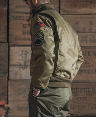 US Army 1st tanker jacket in olive green with embroidered sleeve patch on the upper arm