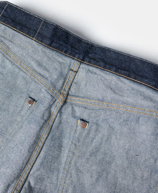 Indigo selvedge denim jeans with coin pocket and gold thread topstitching