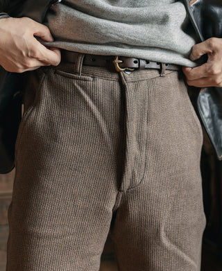 Brown textured stripe pants with belt loops, button closure, and angled front pockets