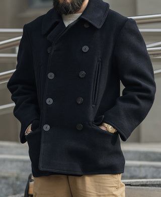 Men's navy peacoat with wide collar and double-breasted button front