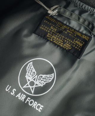 Olive MA-1 flight jacket, interior label with U.S. Air Force logo and text