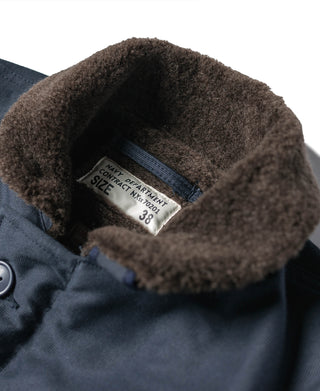 N-1 deck jacket shearling collar with navy department label and “CONTRACT” size tag