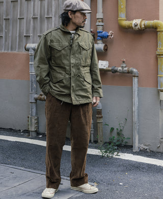 Olive field jacket with multiple pockets and button front