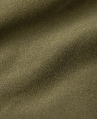 Olive down parka outer fabric texture close-up