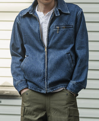 Indigo stonewashed denim jacket with point collar, front zipper, and flap chest pocket