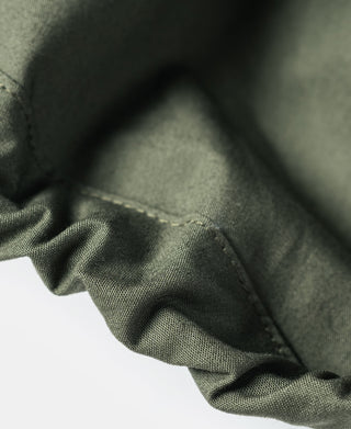 M-65 parka olive with stitched cuff seam and gathered hem detail