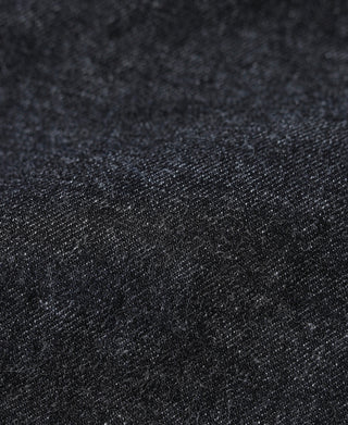 Indigo selvedge denim fabric texture with dense diagonal weave