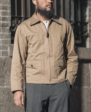 Khaki flight jacket with stand collar, front zipper, and button pockets