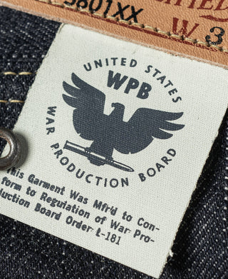 Indigo denim jeans woven label reading UNITED STATES WPB product board
