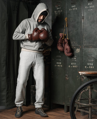 Gray boxing glove pocket lock hood hoodie with drawstring hood and front pouch pocket.