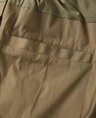 Khaki parka front pocket flap with stitched horizontal seam