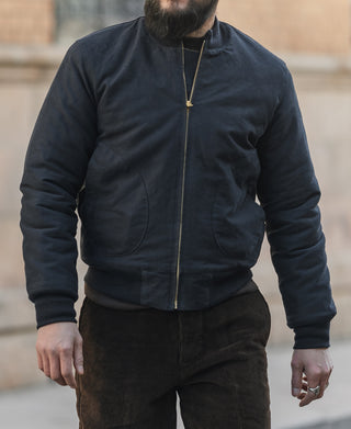 Navy deck jacket with full-length zipper and ribbed cuffs