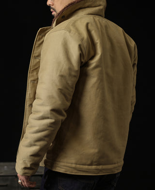 Khaki deck jacket back view with brown sherpa collar and snap cuffs