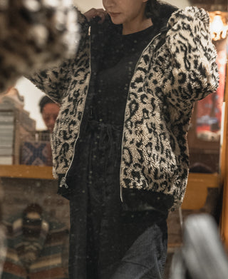 Reversible deck jacket with leopard-print fur lining and black outer shell