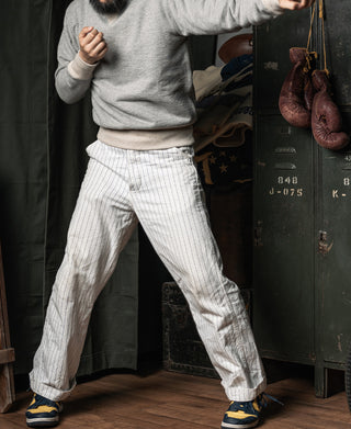 Gray fleece crewneck sweatshirt with ribbed waistband and long sleeves