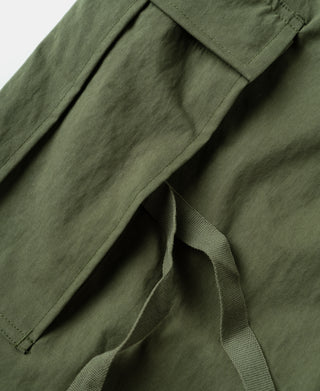 Olive arctic trousers shell with side pocket opening and inner seam panel