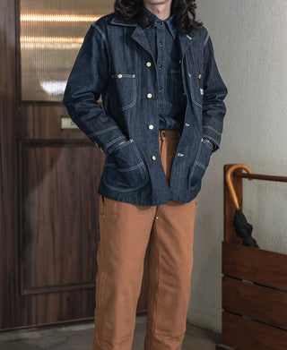 Indigo denim railroad work jacket with flap chest pockets, gold snaps, and hood
