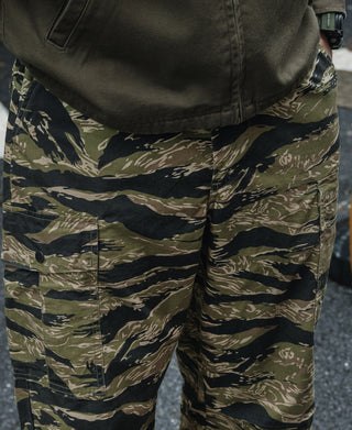 Tiger stripe camo fatigue pants with stitched front pockets and button details