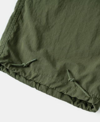 Olive trousers shell hem with elastic gathers and drawstring with cord stoppers