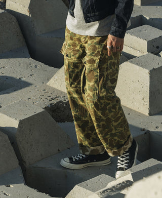 Camouflage cargo trousers with large front flap pockets and belt loops